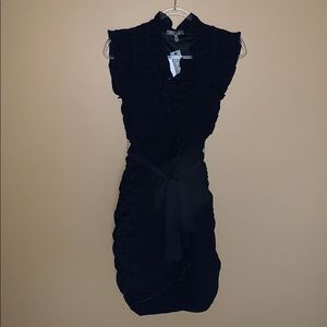 Elegant navy blue ruffled dress.